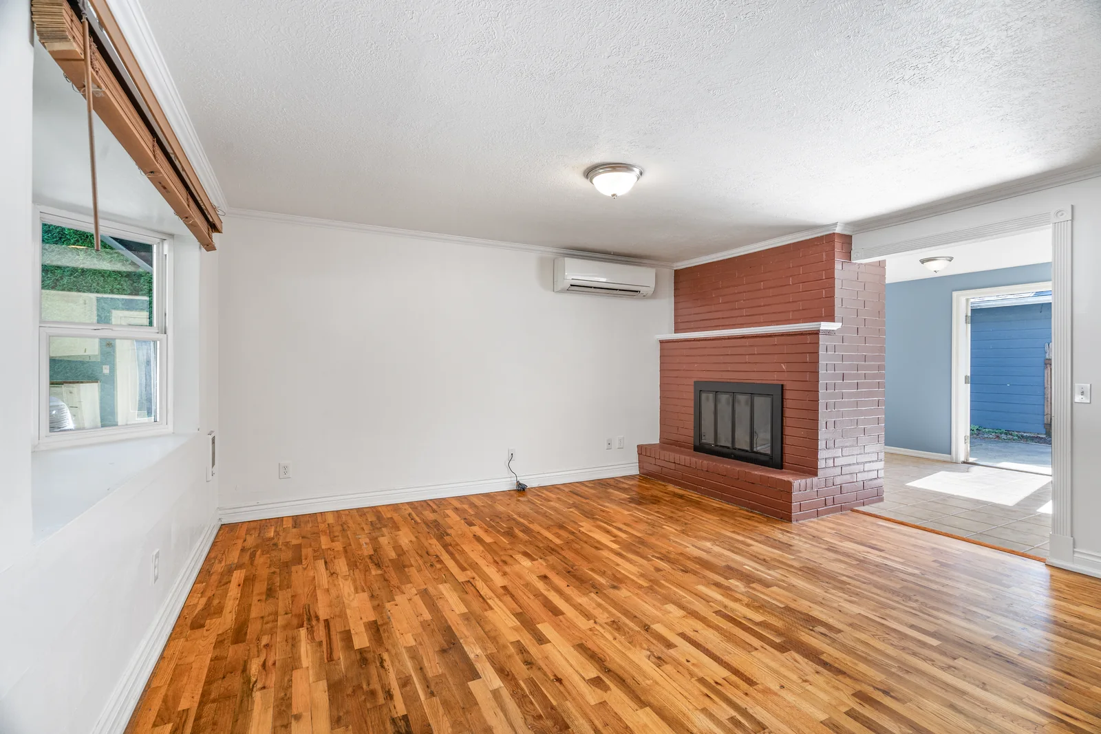 Original empty living room before virtual staging